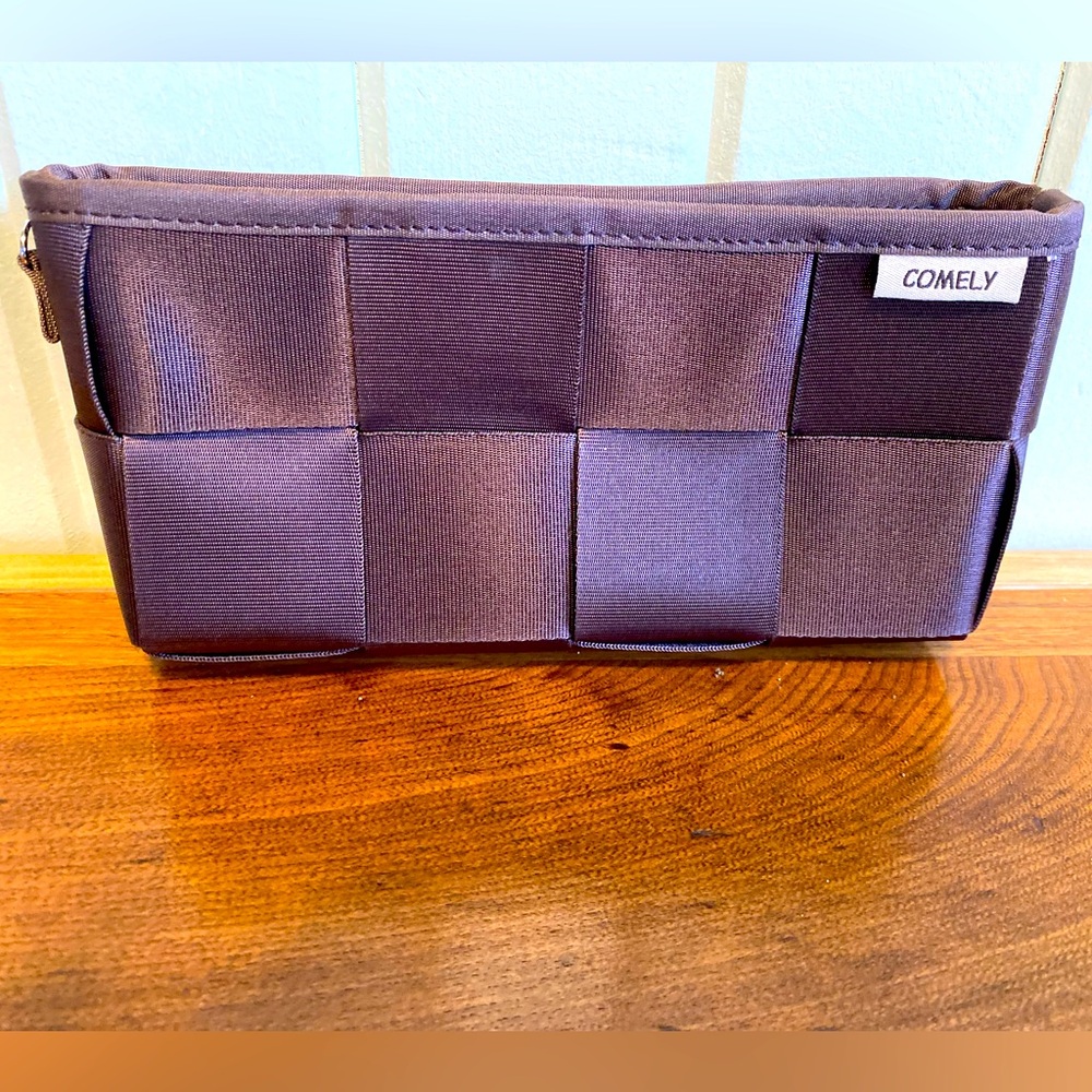 COMELY Seatbelt Clutch Bag Brown